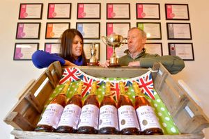 Nadine and Geoff with some of their trophies 