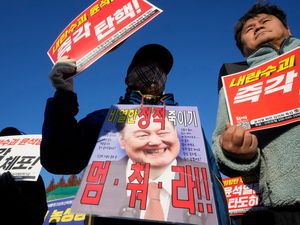 Supporting image for story: South Korea’s leader urged to resign or face impeachment over martial law decree