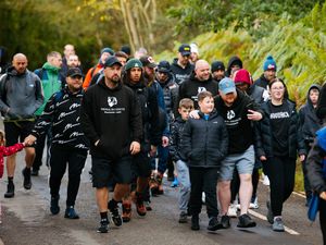Supporting image for story: Ethan, 11, leads emotional 'Viking clap' atop the Wrekin as he faces rare disease