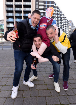 Ryan Bell, Jack Murphy, Ian Murphy, and 'Dion' the doll, from Cannock....