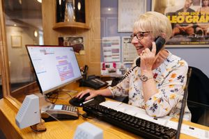 Volunteer Jackie Matthews taking bookings