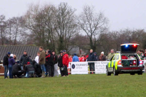 The injured player is treated at at Whitchurch Rugby Club 