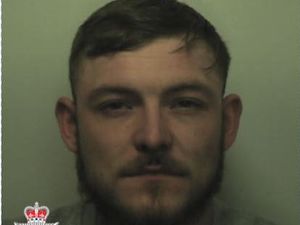 Supporting image for story: Robber threatened pensioner and teenager with machete as they watched TV