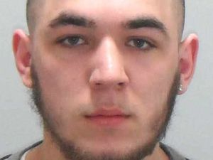 Supporting image for story: Robber with Black County links wanted on recall to prison