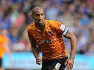 Supporting image for story: Karl Henry switching Christmas lights on at New Cross Hospital