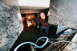 Daryl Lloyd, landlord of the Cross Foxes in Coleham, assesses the flooded