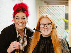 Supporting image for story: Free haircuts bring community together