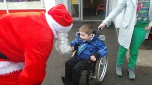 Jayden enjoys a meet with Santa