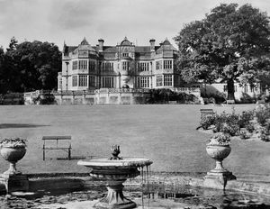 The caption reads: 'A stately home that is a home - Stokesay Court, Onibury, near Ludlow, the private residence of Sir Philip and Lady Magnus Allcroft.' October 2, 1962.