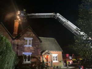 Supporting image for story: Firefighters tackle blaze in chimney after smoke spotted billowing through brickwork