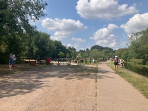 The wildflower meadow by Stourbridge Canal where people had set up deck chairs hoping to see the Red Arrows fly past