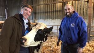 MP Philip Dunne, pictured left, with a farmer