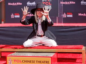Supporting image for story: Diane Keaton recalls childhood dreams of Hollywood as she cements her handprints
