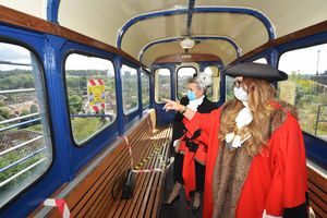 Dean Harris, the High Sheriff of Shropshire and the Mayor of Bridgnorth Councillor Kirstie Hurst-Knight looking at various areas of the Cliff Railway top station