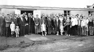 Mr Roberts, who became a club member in 1971, said: 'That was outside the old locker rooms. It was the opening of the locker rooms which were still there until 1993 (i.e. when the current clubhouse was built).' He says one of the children on the far left is Hughie Eardley, still a member. His father was Tony Eardley who ran a big pet shop in Market Drayton. The child mid right, looking away, is he thinks another current member, John Cushing, who now keeps Goldstone Hall hotel. He thinks his father Bill Cushing is the man in the white sweater towards the right. The locker rooms have been demolished. This picture also appears in a book about the history of the golf club which says in its caption that it is the opening of the new locker rooms in 1962.