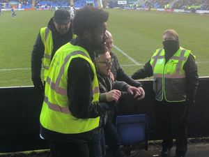 Supporting image for story: Shrewsbury Town stewards praised for helping disabled Luton Town fan