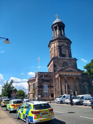 Police cars next to St Chad's Church in Shrewsbury