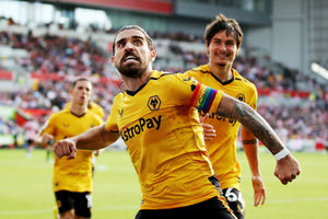 BRENTFORD, ENGLAND - OCTOBER 29: Ruben Neves of Wolverhampton Wanderers celebrates after scoring his team's first goal during the Premier League match between Brentford FC and Wolverhampton Wanderers at Brentford Community Stadium on October 29, 2022 in Brentford, England. (Photo by Jack Thomas - WWFC/Wolves via Getty Images).