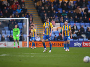 Supporting image for story: Tom Bloxham red card: How many games will the striker miss?