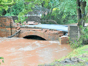 Supporting image for story: Villagers' joy as flood-damaged bridge reopens