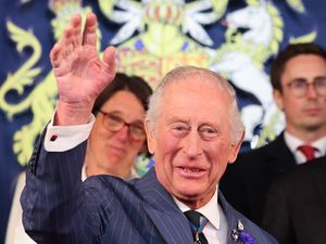 The King waving during the concert celebrating the 80th Anniversary of VE Day