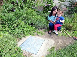 Supporting image for story: Sewage floods stops Oswestry family using garden