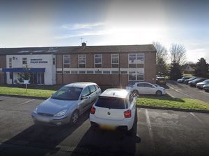 Supporting image for story: Oswestry woman who threw lumps of wood at police station cars is fined 