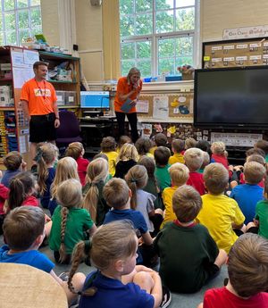 Jase and Jodie speaking with Thomas Russell Infant School children