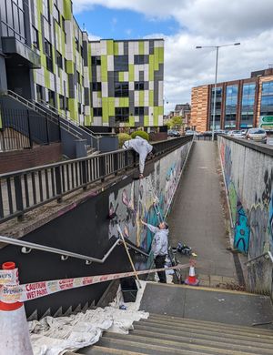 Painting is underway in preparation for the new murals. Photo: Asylum Art Gallery
