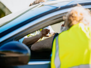 Supporting image for story: 400 turn out for drive-through flu vaccination clinic
