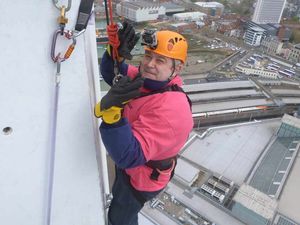 Supporting image for story: Wolverhampton man Nick abseils 100m for 'love of his life' Andrea