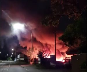 The fire raging at the trading estate. Photo: Ben Allen