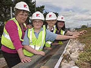 Supporting image for story: Hard hat youngsters proud of new school