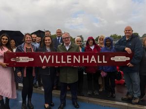 Supporting image for story: Willenhall community restores historic railway sign 'discovered at bottom of pile of rubbish' for new station
