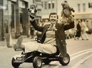 Mr Caswell celebrates toy shop of the year honour in 1989