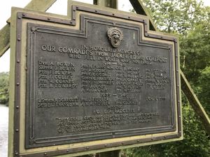 The plaque at the bridge honouring men who died fighting in the First World War and Second World War