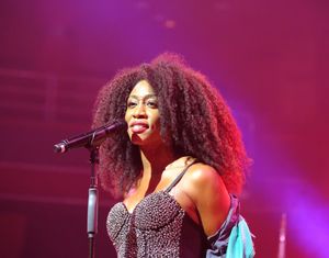 Beverley Knight performing on stage at Birmingham's Symphony Hall