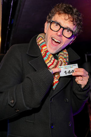 Mark Charnock also helped to draw the raffle on stage. Photo: Kennett Photography