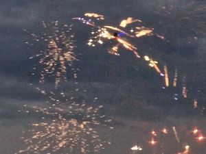 Supporting image for story: 'Like something out of a sci-fi movie': Firework-shooting helicopter wows villagers