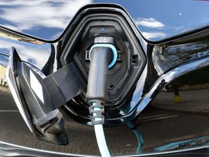 An electric car being recharged