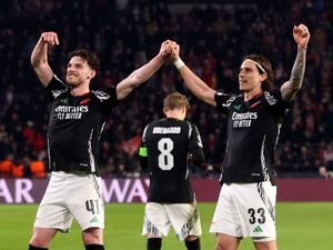 Arsenal’s Riccardo Calafiori celebrates scoring their side’s seventh goal against PSV Eindhoven