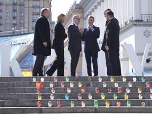 From left Poland’s Prime Minister Donald Tusk, Ukrainian first lady Olena Zelenska, Sir Keir Starmer, French President Emanuel Macron, German Chancellor Friedrich Merz and Ukrainian President Volodymyr Zelensky in Maidan Square in Kyiv