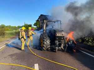 Supporting image for story: Fire engulfs tractor and closes busy road near Market Drayton 