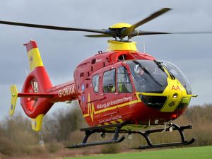 Supporting image for story: Paraglider crash pilot is airlifted to hospital