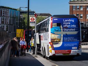 A coach picking up passengers in Paddington, west London