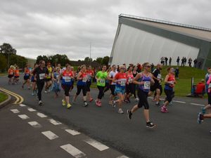 Supporting image for story: Runners get off to a flying start at RAF base as Spitfire race returns