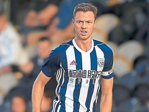 Supporting image for story: West Brom captain Jonny Evans eager to 'get on with it' after transfer speculation