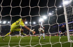 Aston Villa goalkeeper Emiliano Martinez makes a save from Juventus' Francisco Conceicao (right) during the UEFA Champions League, league stage match at Villa Park, Birmingham. Picture date: Wednesday November 27, 2024.