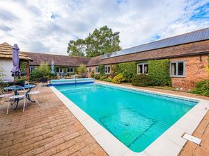Supporting image for story: Stunning £1.45m home converted from working farm with seven bedrooms and outdoor pool