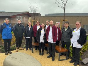 Members of the Radiotherapy Team in the new garden.